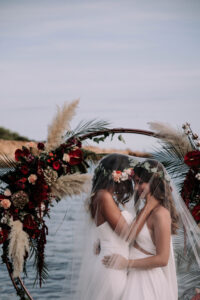 Two brides love is love shoot cathedral veil with lace iniza destination wedding inspiration 72 200x300
