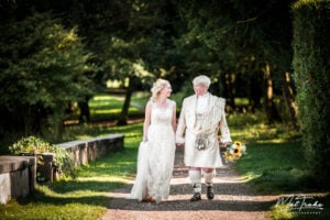 brides romantic walk just married wortley lgbtq woodland trees sunshine stroll 300x200