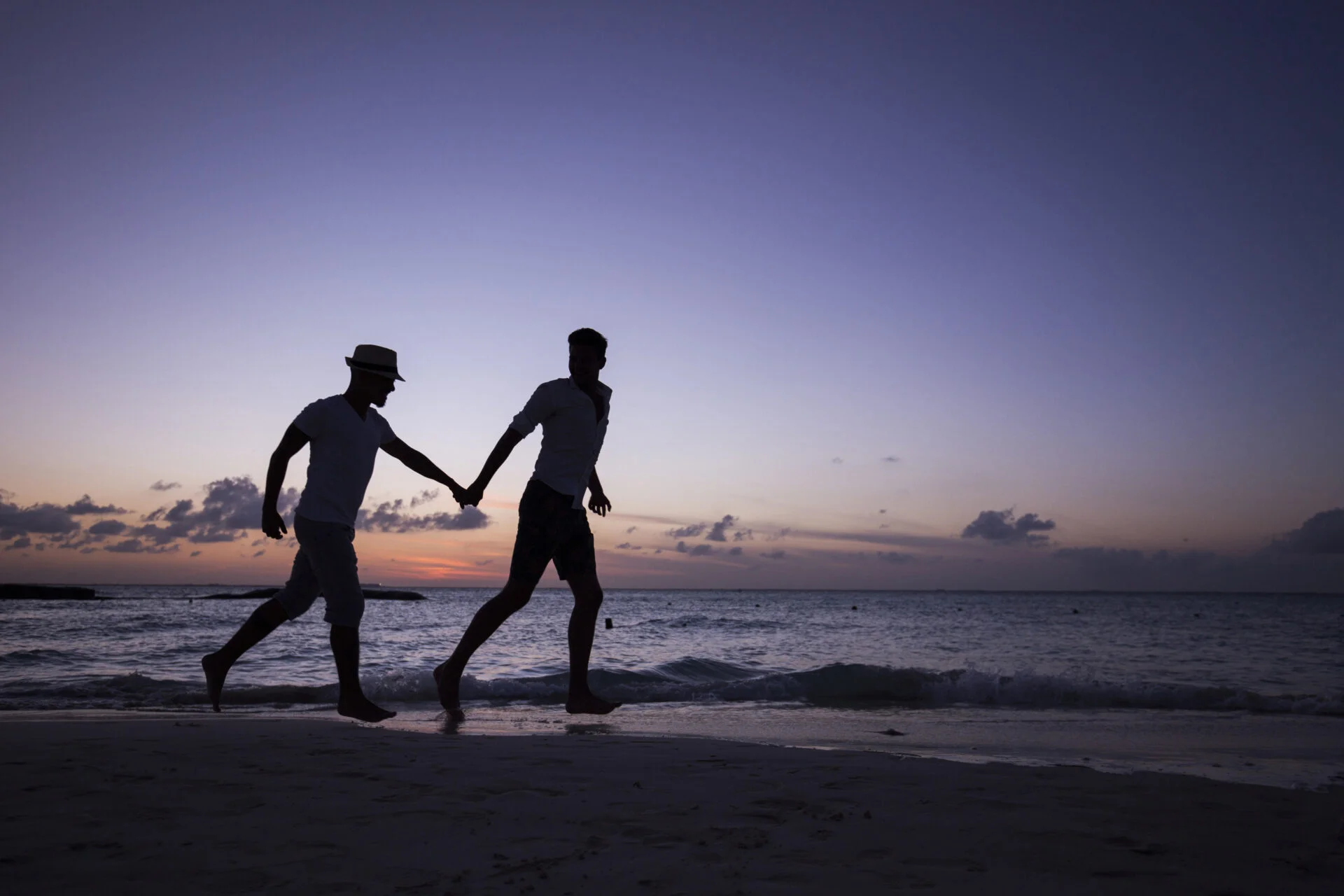 gay couple on beach