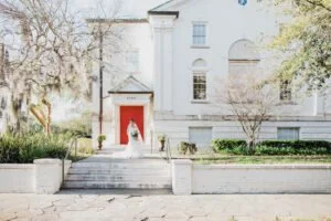 Bride with red door 300x200