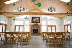 indoor wedding ceremony at meadow creek lodge event center in colorado orig 300x200