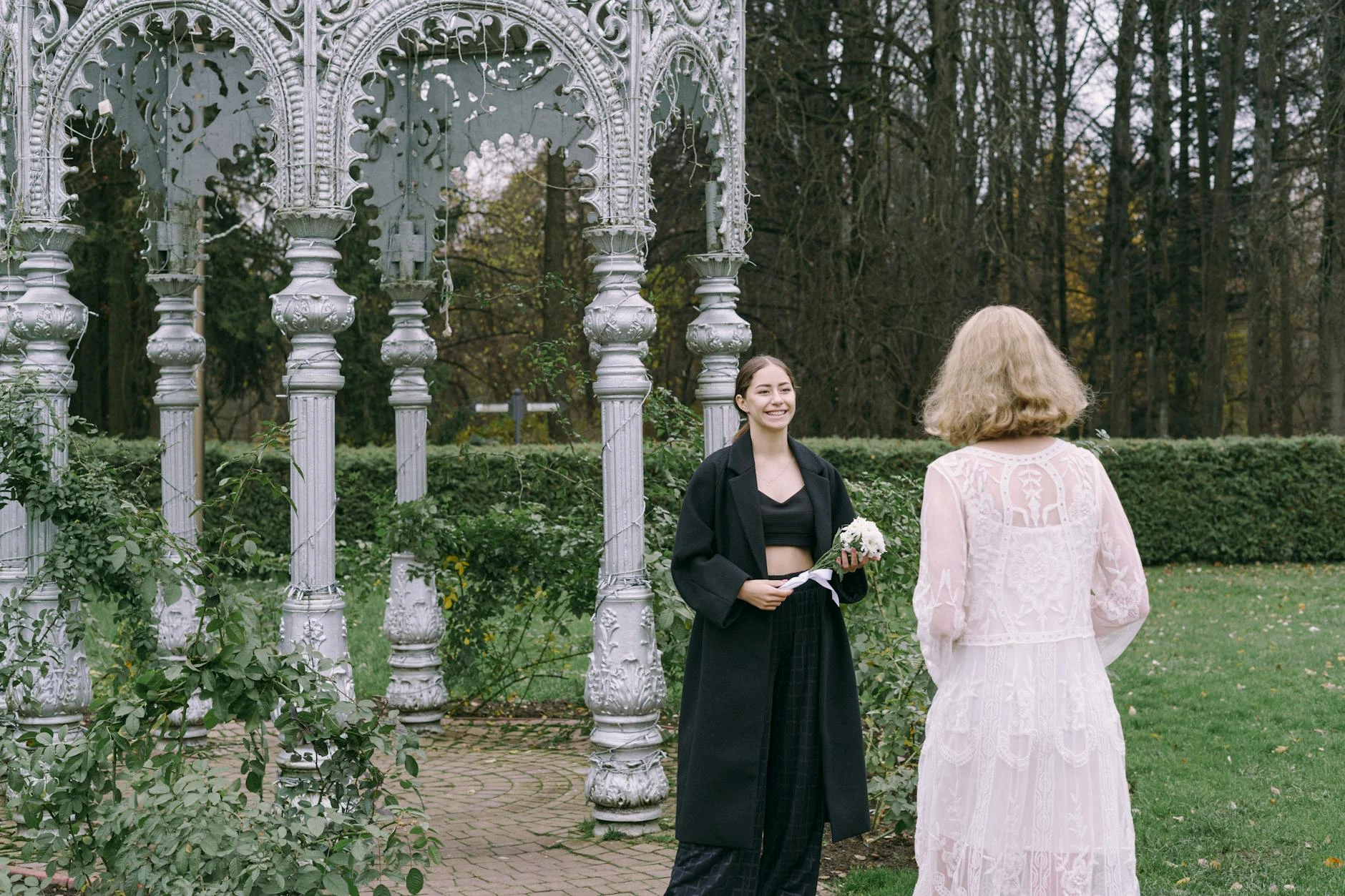 a couple standing facing each other